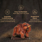 Short Details of Elegant Red Elephant with Golden Tusks